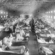 Influenza victims crowd into an emergency hospital at Camp Funston, a subdivision of Fort Riley in Kansas, in 1918.